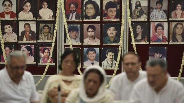 Family members of the Uphaar fire tragedy victims grieve on its 21st Anniversary at Green Park in New Delhi. It was on June 13, 1997, that Bollywood blockbuster ‘Border’ was screening at Uphaar Cinema in south Delhi’s Green Park when a fire broke out halfway through the movie. The incident claimed the lives of 59 people and over 100 were injured due to suffocation in the ensuing stampede. (Sanchit Khanna / HT Photo)