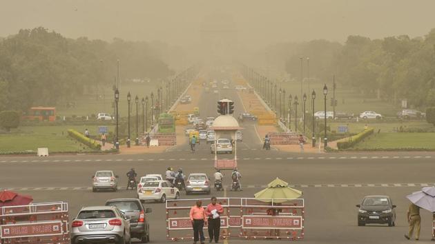 A view of Vijay Chowk and Rajpath during a mild dust storm in New Delhi on Tuesday, June 12, 2018. (PTI) A view of Vijay Chowk and Rajpath during a mild dust storm in New Delhi on Tuesday, June 12, 2018. (PTI)