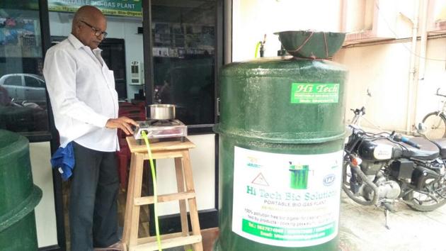 Rajagolapan Nair with his biogas plant. The plant received ISO certification on May 22.(HT)