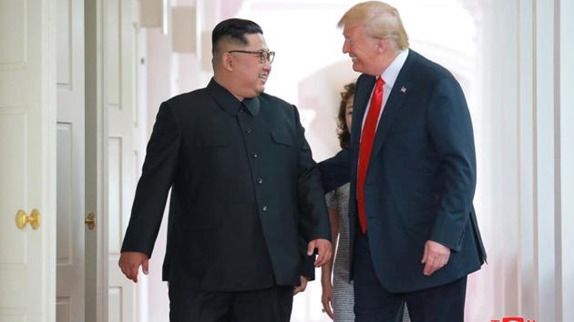 US President Donald Trump walks with North Korean leader Kim Jong Un at the Capella Hotel on Sentosa island in Singapore.(Reuters File Photo) US President Donald Trump walks with North Korean leader Kim Jong Un at the Capella Hotel on Sentosa island in Singapore.(Reuters File Photo)
