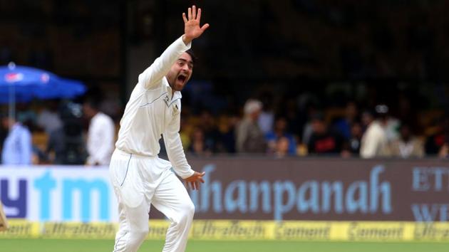 Rashid Khan got his first Test wicket when he dismissed Ajinkya Rahane during the one-off Test against Afghanistan. Get highlights of India vs Afghanistan , one-off Test, Bangalore here.(BCCI)