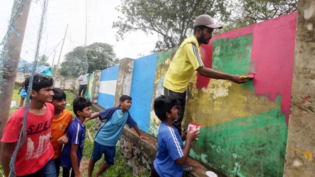 The month long tournament is more than a festival in these parts. Walls have been painted over with flags of competing teams and local favourites. Allegiances to the 32 nations competing in the games peek from every corner but Latin American teams seems to have an edge over others. (K Sasi / HT Photo) The month long tournament is more than a festival in these parts. Walls have been painted over with flags of competing teams and local favourites. Allegiances to the 32 nations competing in the games peek from every corner but Latin American teams seems to have an edge over others. (K Sasi / HT Photo)