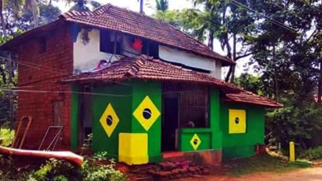 A love for Brazil has washed over this Kerela home and it’s not the only instance. In south Kerala’s Kollam, a football-crazed fan has turned his whole house yellow in the colours of the Brazilian team and is going by ‘Brazil Sudheer’ himself. His vehicles, covered in team decals will be touring Kozhikkode and Malappuram districts as the game gets going. (K Sasi / HT Photo) A love for Brazil has washed over this Kerela home and it’s not the only instance. In south Kerala’s Kollam, a football-crazed fan has turned his whole house yellow in the colours of the Brazilian team and is going by ‘Brazil Sudheer’ himself. His vehicles, covered in team decals will be touring Kozhikkode and Malappuram districts as the game gets going. (K Sasi / HT Photo)