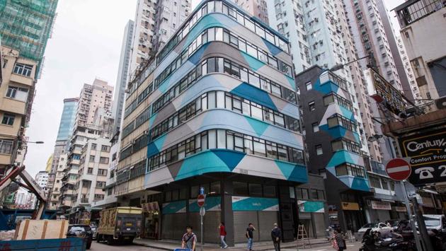 Blocks of sleek miniature apartments packed with mod cons are springing up around the densely packed city, pitched as an attractive and more affordable lifestyle choice, but still at an eye-watering cost. Hong Kong’s real estate is the most expensive in the world, with median house prices at 19.4 times median incomes -- the worst ratio globally. (Isaac Lawrence / AFP)