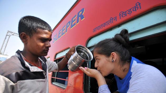 Representative image. A train passenger trying to quenching her thirst at Jalandhar Cantt railway station on Tuesday. (Pareep Pandit/HT Photo) Representative image. A train passenger trying to quenching her thirst at Jalandhar Cantt railway station on Tuesday. (Pareep Pandit/HT Photo)