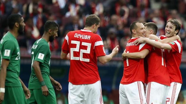 Goals from Yury Gazinsky, Denis Cheryshev (2), Artem Dzyuba and Aleksandr Golovin gave Russia a commanding 5-0 win over Saudi Arabia. (AP)