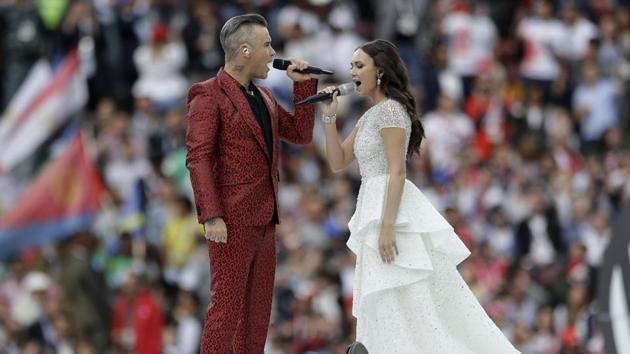 Robbie Williams and Aida Garifullina perform ahead of the group A match between Russia and Saudi Arabia. (AP) Robbie Williams and Aida Garifullina perform ahead of the group A match between Russia and Saudi Arabia. (AP)