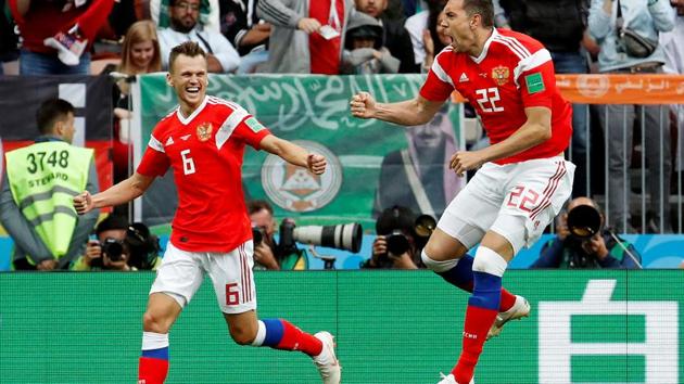 Russia's Artem Dzyuba celebrates scoring their third goal with Denis Cheryshev. (REUTERS)