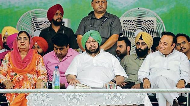 Chief minister Capt Amarinder Singh flanked in the front row by former CM Rajinder Kaur Bhattal (left) and Jalandhar MP Santokh Singh Chaudhary at Shahkot on Thursday.(Pradeep Pandit/HT)