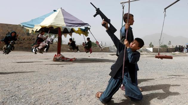 Afghan children ride swings during the first day of the holiday of Eid al-Fitr, which marks the end of the holy month of Ramadan, in Kabul, Afghanistan. (Omar Sobhani / REUTERS) Afghan children ride swings during the first day of the holiday of Eid al-Fitr, which marks the end of the holy month of Ramadan, in Kabul, Afghanistan. (Omar Sobhani / REUTERS)