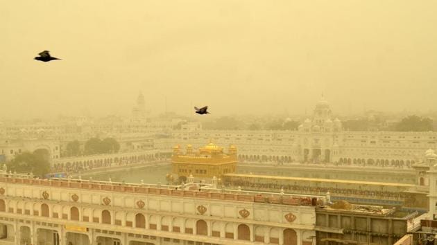 A view of the Golden Temple engulfed in haze due to sudden change in weather, in Amritsar on Friday. (Sameer Sehgal/HT)