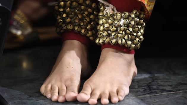 A detail view of a ghunghroo worn by a student during her trials. Delhi University reserves 5% seats for undergraduate students under the ECA category. Here, cut offs are relaxed by up to 15%. Qualifying means students must sign an undertaking stating that they will use their skills for the college and university during the entire three-year period. (Arvind Yadav / HT Photo) A detail view of a ghunghroo worn by a student during her trials. Delhi University reserves 5% seats for undergraduate students under the ECA category. Here, cut offs are relaxed by up to 15%. Qualifying means students must sign an undertaking stating that they will use their skills for the college and university during the entire three-year period. (Arvind Yadav / HT Photo)