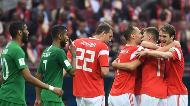 Russia'players celebrate after scoring their fifth goal during the Russia 2018 World Cup Group A football match between Russia and Saudi Arabia at the Luzhniki Stadium in Moscow .(AFP)