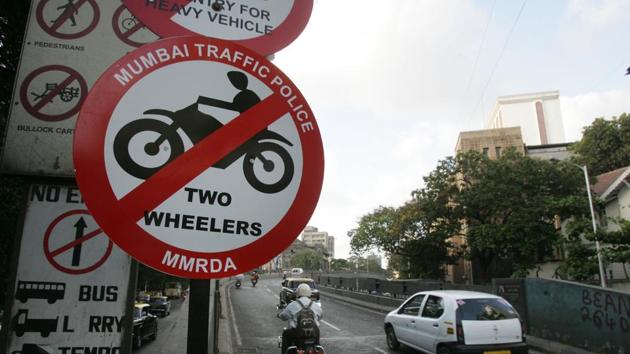 Although two-wheelers are not allowed on the flyover, bikers continue ply on the dangerous bridge.(HT File) Although two-wheelers are not allowed on the flyover, bikers continue ply on the dangerous bridge.(HT File)