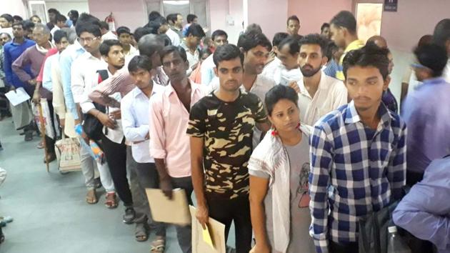 Patients in long queues outside doctors' chambers due to boycott by Resident doctors at SMS hospital on Friday. (HT PHOTO)