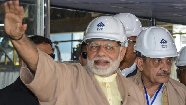 Prime Minister Narendra Modi at the Bhilai Steel Plant in Chhattisgarh on June 14, 2018. During his interaction with traders and shopkeepers, Modi urged them to use the Bhim app for digital payments.(PTI)