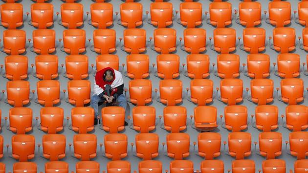An Egyptian fan seats after the end of the group A match between Egypt and Uruguay at the FIFA World Cup 2018 in the Yekaterinburg Arena in Yekaterinburg, Russia, Friday, June 15, 2018. Uruguay defeated Egypt 1-0.(AP)