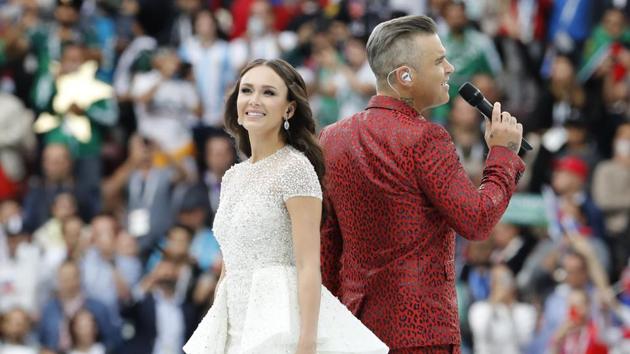 Robbie Williams sings was joined by Russian soprano Aida Garifullina ahead of the start of the group A match between Russia and Saudi Arabia. Williams said he was fulfilling “a boyhood dream” performing at the World Cup, if only as a singer and not with the ball. The singer belted out hits to a cheering crowd. (Antonio Calanni / AP)