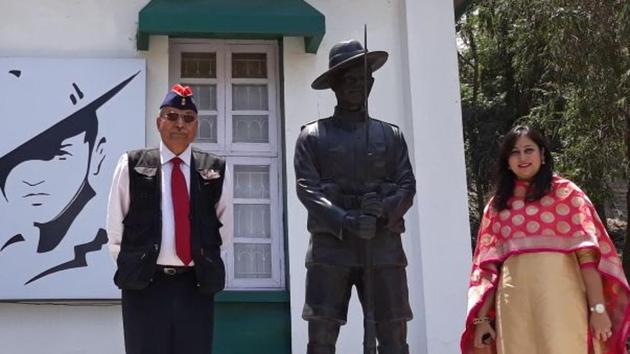 The writer with his daughter-in-law with the statue of a Gorkha Soldier.