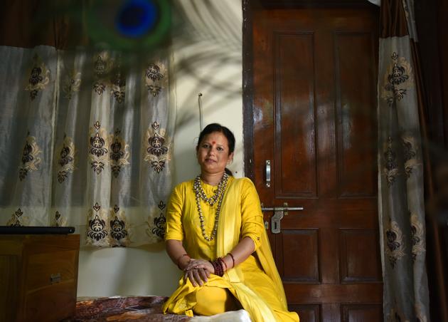 Archana Sarmandal describes herself as a ‘housewife, mother, astrologer and religious leader’. ‘I meet with followers after my husband has left for work and my children have gone to school,’ she says. (Raj K Raj / HT Photo) Archana Sarmandal describes herself as a ‘housewife, mother, astrologer and religious leader’. ‘I meet with followers after my husband has left for work and my children have gone to school,’ she says. (Raj K Raj / HT Photo)