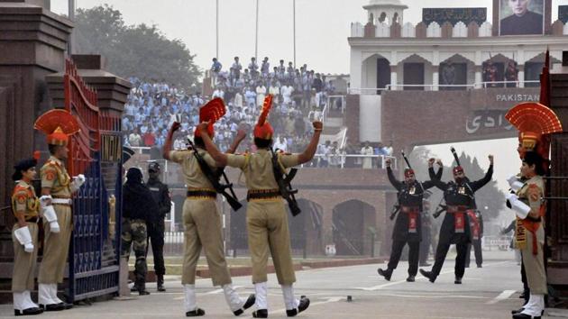 BSF and Pakistan Rangers perform the beating of the retreat ceremony at the Attari- Wagah border. (PTI File) BSF and Pakistan Rangers perform the beating of the retreat ceremony at the Attari- Wagah border. (PTI File)