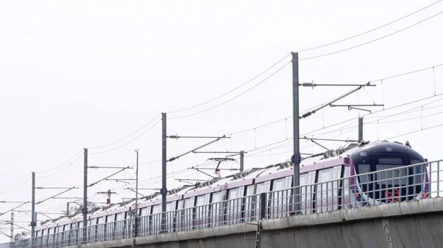 The project is aimed at boosting the city’s local transportation and giving people the option of going from the Gurugram railway station to Delhi with one changeover at Huda City Centre.(HT File Photo)