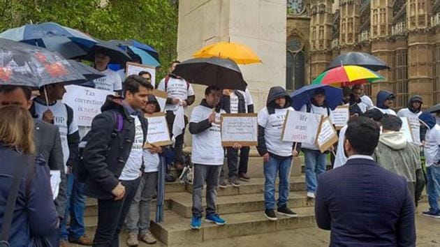 Indians protest against UK’s visa rules outside the Parliament in London. The lack of mention in the expanded list means Indian students applying for educational courses will continue to face rigorous checks and documentary requirements.(PTI File Photo)