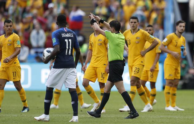 Referee Andres Cunha from Uruguay, centre, gestures for a penalty fro France after consulting VAR, from which France's Antoine Griezmann scored, during the group C match between France and Australia at the 2018 soccer World Cup in the Kazan Arena in Kazan. (AP) Referee Andres Cunha from Uruguay, centre, gestures for a penalty fro France after consulting VAR, from which France's Antoine Griezmann scored, during the group C match between France and Australia at the 2018 soccer World Cup in the Kazan Arena in Kazan. (AP)