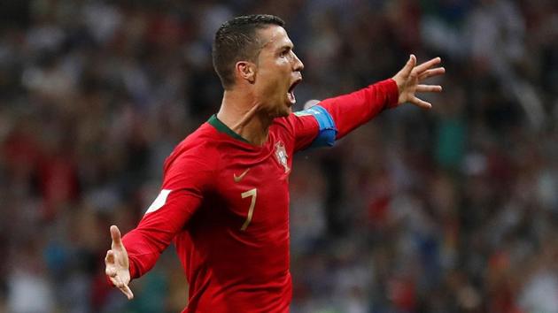 Get highlights of Portugal vs Spain, FIFA World Cup 2018 here. Cristiano Ronaldo scored a hat-trick as Portugal played out a thrilling 3-3 draw vs Spain in their Group B match on Friday.(REUTERS)