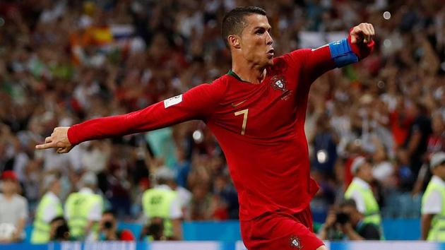 Cristiano Ronaldo celebrates after scoring his hat-trick during the FIFA World Cup 2018 encounter against Spain.(REUTERS)