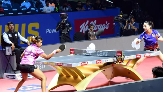 Ayhika Mukherjee (left) of RP-SG in action during the first tie of day four of Ultimate Table Tennis tournament at Shiv Chhatrapati sports complex in Balewadi on Sunday. (HT PHOTO) Ayhika Mukherjee (left) of RP-SG in action during the first tie of day four of Ultimate Table Tennis tournament at Shiv Chhatrapati sports complex in Balewadi on Sunday. (HT PHOTO)