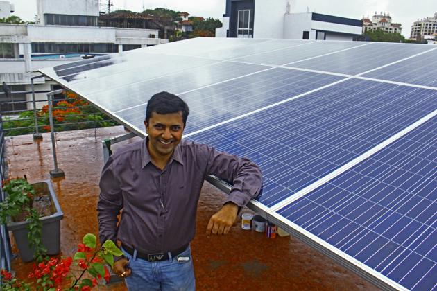 Mehul Mehta was convinced by his son Maanav to install solar panels on his four bungalows in Madh Island.(HT Photo)