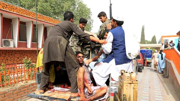 An injured being taken to hospital after the suicide bombing in Jalalabad.(Reuters) An injured being taken to hospital after the suicide bombing in Jalalabad.(Reuters)