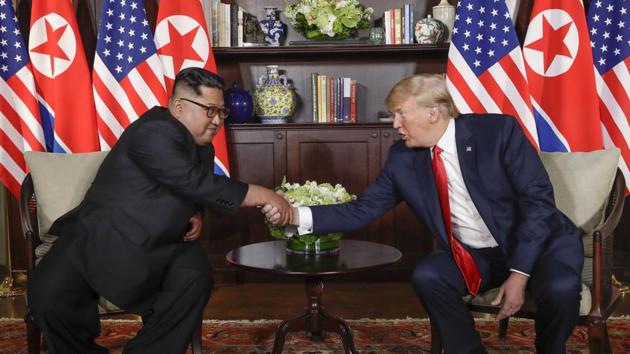 North Korea leader Kim Jong Un, left, and U.S. President Donald Trump shake hands during their first meeting at the Capella resort on Sentosa Island in Singapore on June 12, 2018. (AP) North Korea leader Kim Jong Un, left, and U.S. President Donald Trump shake hands during their first meeting at the Capella resort on Sentosa Island in Singapore on June 12, 2018. (AP)