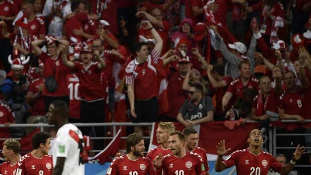 Denmark's forward Yussuf Poulsen celebrates with teammates after scoring a goal during the Russia 2018 World Cup Group C football match between Peru and Denmark as the Scandinavian country started their campaign on a high. (AFP)