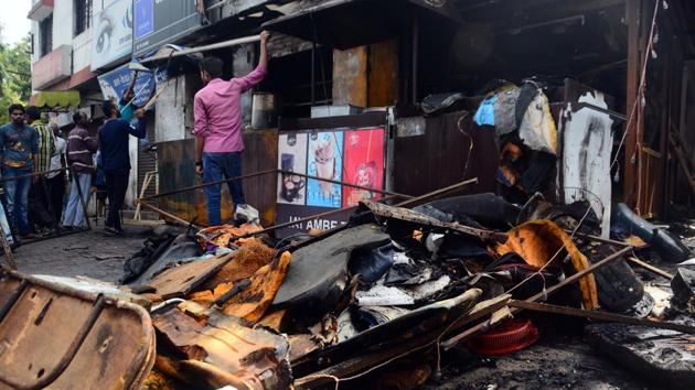 FIRE AND FURY: A tea shop in Yerawada was gutted to the ground after a fire broke out as a result of a leaking gas cylinder on Thursday. No casualties were reported. (Shankar Narayan/HT PHOTO) FIRE AND FURY: A tea shop in Yerawada was gutted to the ground after a fire broke out as a result of a leaking gas cylinder on Thursday. No casualties were reported. (Shankar Narayan/HT PHOTO)