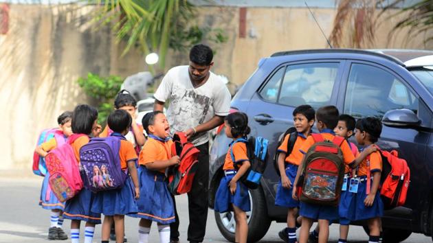 DAY ONE JITTERS: Students doing their best to cope on their first day at the Eon Gyanankur English school in the city on Friday. (Shankar Narayan/HT PHOTO) DAY ONE JITTERS: Students doing their best to cope on their first day at the Eon Gyanankur English school in the city on Friday. (Shankar Narayan/HT PHOTO)
