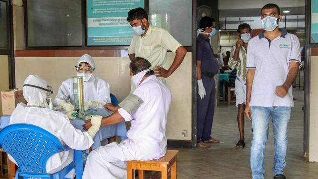 Doctors and patients wear safety masks as a precautionary measure after the 'Nipah' virus outbreak, at a medical college in Kozhikode.(PTI File Photo)