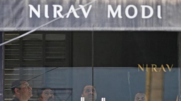 Security guards stand inside a Nirav Modi showroom in New Delhi during a raid by the Enforcement Directorate, February 15, 2018. (Reuters File) Security guards stand inside a Nirav Modi showroom in New Delhi during a raid by the Enforcement Directorate, February 15, 2018. (Reuters File)