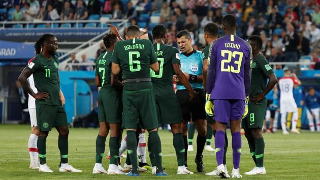 Nigeria players remonstrate after referee Sandro Ricci awarded Croatia a penalty (REUTERS)