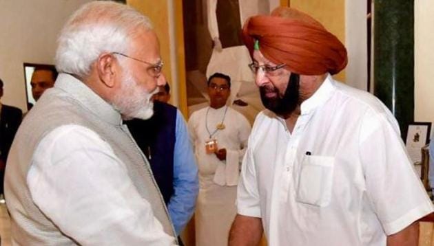 Punjab chief minister Capt Amarinder Singh with Prime Minister Narendra Modi during the Niti Aayog meet on Sunday. (HT Photo) Punjab chief minister Capt Amarinder Singh with Prime Minister Narendra Modi during the Niti Aayog meet on Sunday. (HT Photo)