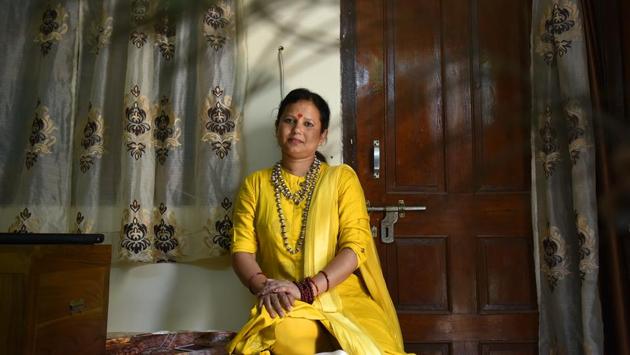 Archana Sarmandal describes herself as a ‘housewife, mother, astrologer and religious leader.’ All it took for her to turn a religious leader was a moment when “her eyes were opened to her own potential”, as she sat outside a temple. Of her visitors, she said, “Some come to me with health problems, other for help with their careers... What do people give me in return? That is out of their own happiness.” (Raj K Raj / HT Photo) Archana Sarmandal describes herself as a ‘housewife, mother, astrologer and religious leader.’ All it took for her to turn a religious leader was a moment when “her eyes were opened to her own potential”, as she sat outside a temple. Of her visitors, she said, “Some come to me with health problems, other for help with their careers... What do people give me in return? That is out of their own happiness.” (Raj K Raj / HT Photo)