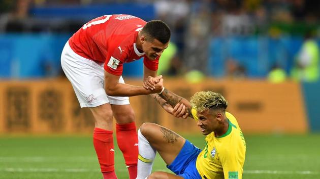 Neymar became the most fouled player in a World Cup game since England’s Alan Shearer against Tunisia in 1998, with the Brazil striker having been illegally halted by Switzerland 10 times throughout the game.(AFP)