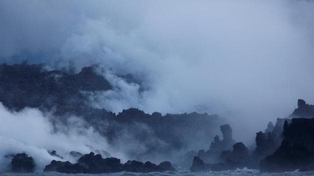 Clouds of ‘laze’, composed of steam, acid and volcanic glass, rise from lava flowing into the Pacific Ocean. Altman estimated they have $100,000 worth of marijuana in the field that they are harvesting. “That’s why we didn’t leave. It’s taken a lot of work.” He said he doesn’t want leave behind his home and marijuana crop with no income and nowhere to live. (Terray Sylvester / REUTERS) Clouds of ‘laze’, composed of steam, acid and volcanic glass, rise from lava flowing into the Pacific Ocean. Altman estimated they have $100,000 worth of marijuana in the field that they are harvesting. “That’s why we didn’t leave. It’s taken a lot of work.” He said he doesn’t want leave behind his home and marijuana crop with no income and nowhere to live. (Terray Sylvester / REUTERS)