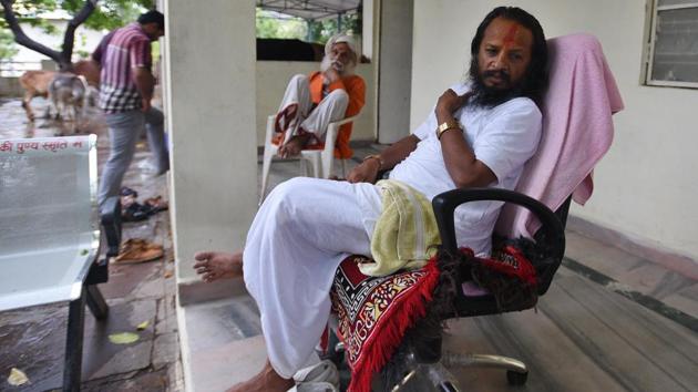 On March 31, religious leaders in the state announced a Narmada Ghotala Yatra that would “expose the state government’s false claims of conservation of the Narmada river.” On April 3, five spiritual leaders were offered positions on a committee to conserve the Narmada; on April 4, the march was called off. Mahant Chandrama Das Tyagi (front) was one of them. (Raj K Raj / HT Photo) On March 31, religious leaders in the state announced a Narmada Ghotala Yatra that would “expose the state government’s false claims of conservation of the Narmada river.” On April 3, five spiritual leaders were offered positions on a committee to conserve the Narmada; on April 4, the march was called off. Mahant Chandrama Das Tyagi (front) was one of them. (Raj K Raj / HT Photo)