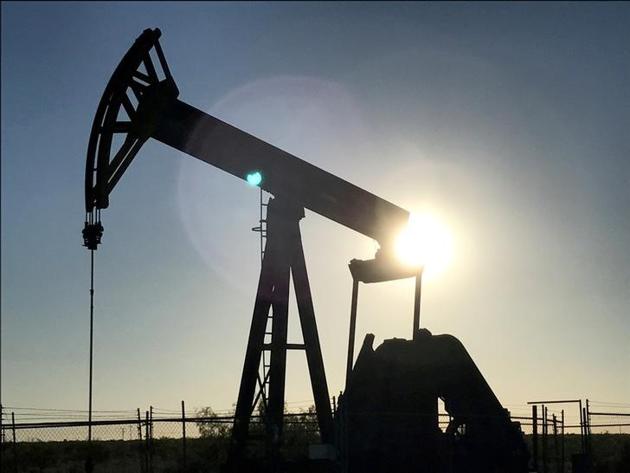 An oil pump is seen operating in the Permian Basin near Midland, Texas, US. West Texas Intermediate crude for July delivery fell as much as $1.47 to $63.59 a barrel on the New York Mercantile Exchange and traded at $63.77 at 11:34 am in Tokyo. (Reuters File Photo) An oil pump is seen operating in the Permian Basin near Midland, Texas, US. West Texas Intermediate crude for July delivery fell as much as $1.47 to $63.59 a barrel on the New York Mercantile Exchange and traded at $63.77 at 11:34 am in Tokyo. (Reuters File Photo)