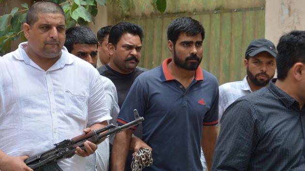 The STF further sought his production warrant in connection with a murder case in Bhiwani, Haryana, from the Panchkula court.(Sant Arora/HT) The STF further sought his production warrant in connection with a murder case in Bhiwani, Haryana, from the Panchkula court.(Sant Arora/HT)
