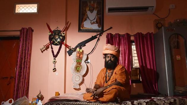 Yogi Peer Ramnath, head of a 20-acre temple compound said he started a group called Hindu Vahini, “which will defend any attack on the Hindu religion”. Another baba in Indore, Radhe Radhe Baba, who moved here from UP and now heads a temple complex, spends hours in his inner chamber, watching fairly unchanging CCTV footage of the complex and the streets outside. (Raj K Raj / HT Photo) Yogi Peer Ramnath, head of a 20-acre temple compound said he started a group called Hindu Vahini, “which will defend any attack on the Hindu religion”. Another baba in Indore, Radhe Radhe Baba, who moved here from UP and now heads a temple complex, spends hours in his inner chamber, watching fairly unchanging CCTV footage of the complex and the streets outside. (Raj K Raj / HT Photo)