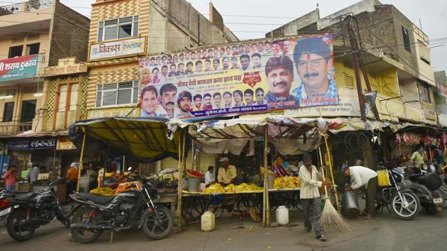 A banner advertises a religious gathering in Indore. In April this year, five godmen were offered minister-of-state-level berths in the state. Politicians in the state don’t shy away from wearing their relationships with spiritual leaders on their sleeves. It is an accepted culture, said Rasheed Kidwai, writer, political author and visiting fellow at Observer Research Foundation. (Raj K Raj / HT Photo) A banner advertises a religious gathering in Indore. In April this year, five godmen were offered minister-of-state-level berths in the state. Politicians in the state don’t shy away from wearing their relationships with spiritual leaders on their sleeves. It is an accepted culture, said Rasheed Kidwai, writer, political author and visiting fellow at Observer Research Foundation. (Raj K Raj / HT Photo)