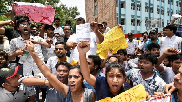 B.Tech degree holders raise slogans during a protest march demanding jobs in Bihar State Electricity Board in Patna. (PTI) B.Tech degree holders raise slogans during a protest march demanding jobs in Bihar State Electricity Board in Patna. (PTI)